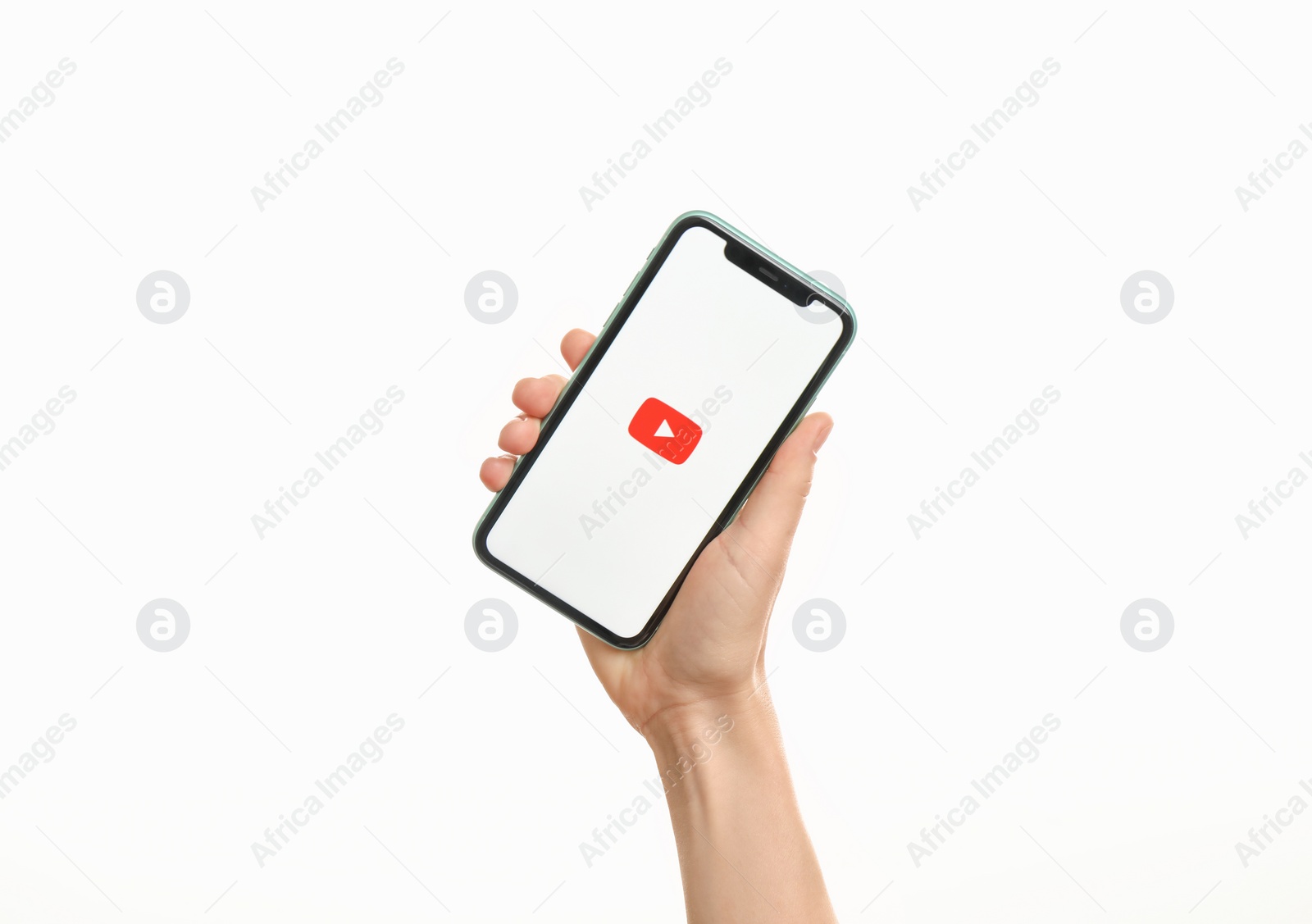 Photo of MYKOLAIV, UKRAINE - JULY 9, 2020: Woman holding  iPhone X with Youtube app on white background, closeup