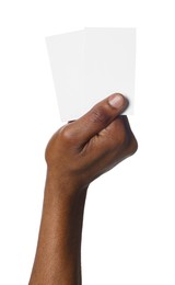 African American man holding paper cards on white background, closeup. Mockup for design