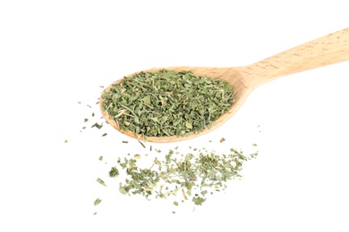 Wooden spoon with dried parsley on white background