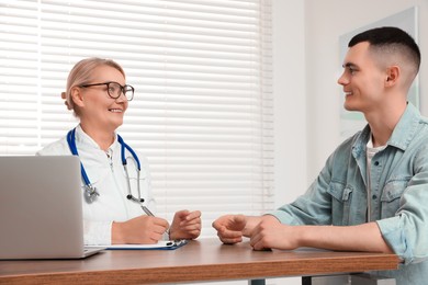 Professional doctor working with patient in clinic