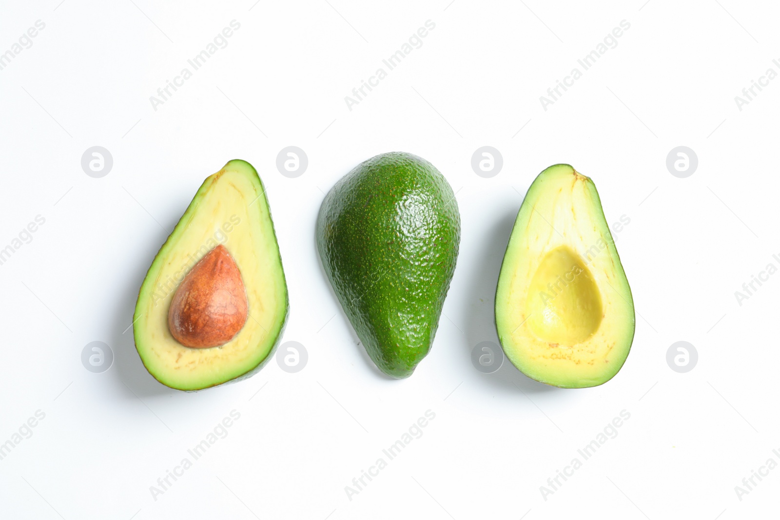 Photo of Composition with ripe fresh avocados on white background