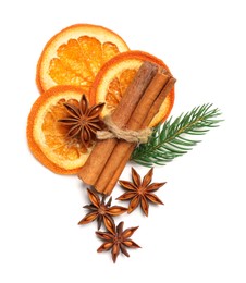 Dry orange slices, fir branch, anise stars and cinnamon sticks isolated on white, top view