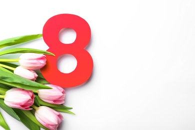 Photo of 8 March greeting card design with tulips on white background, top view. Space for text
