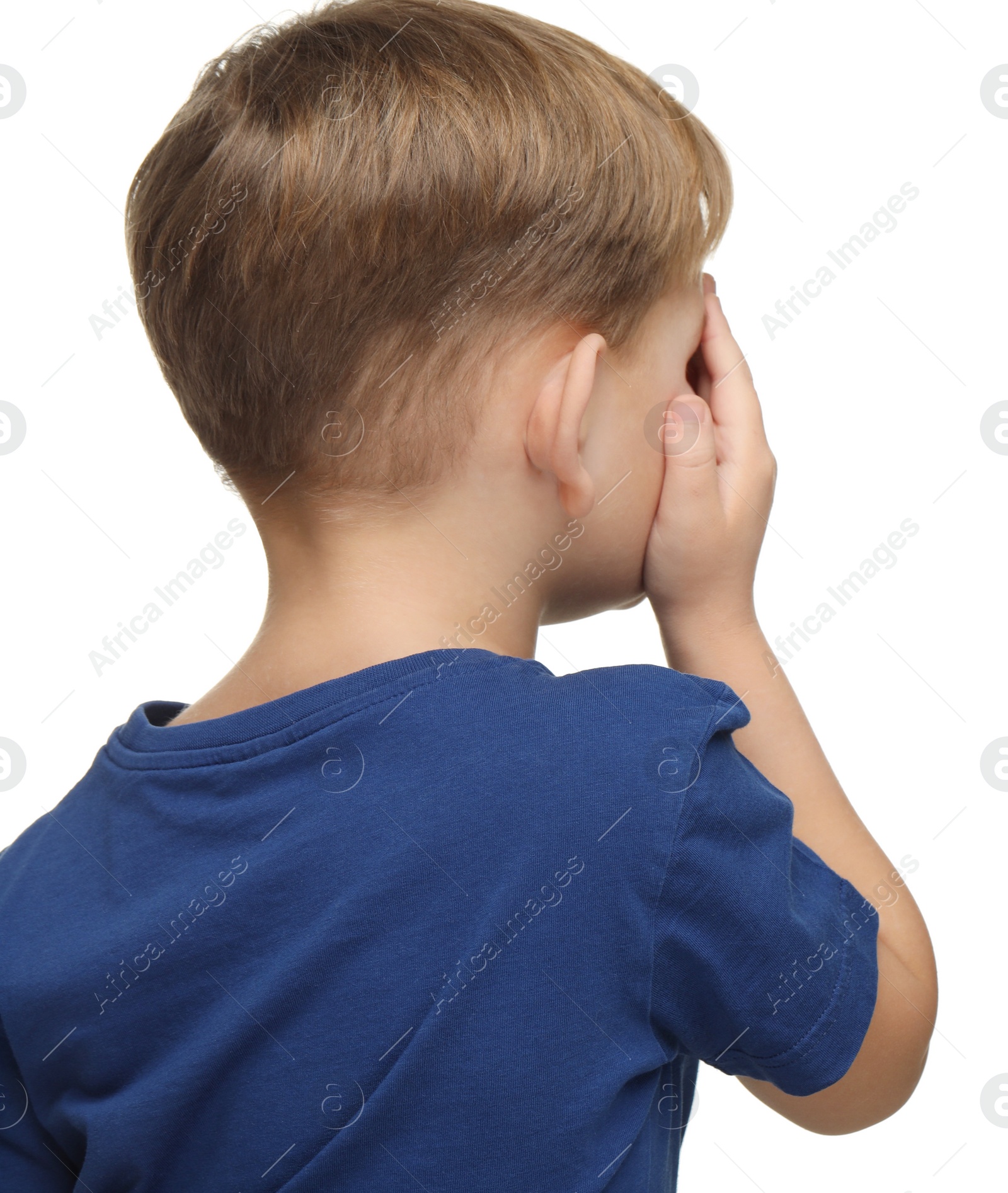 Photo of Little boy covering his eye on white background, back view