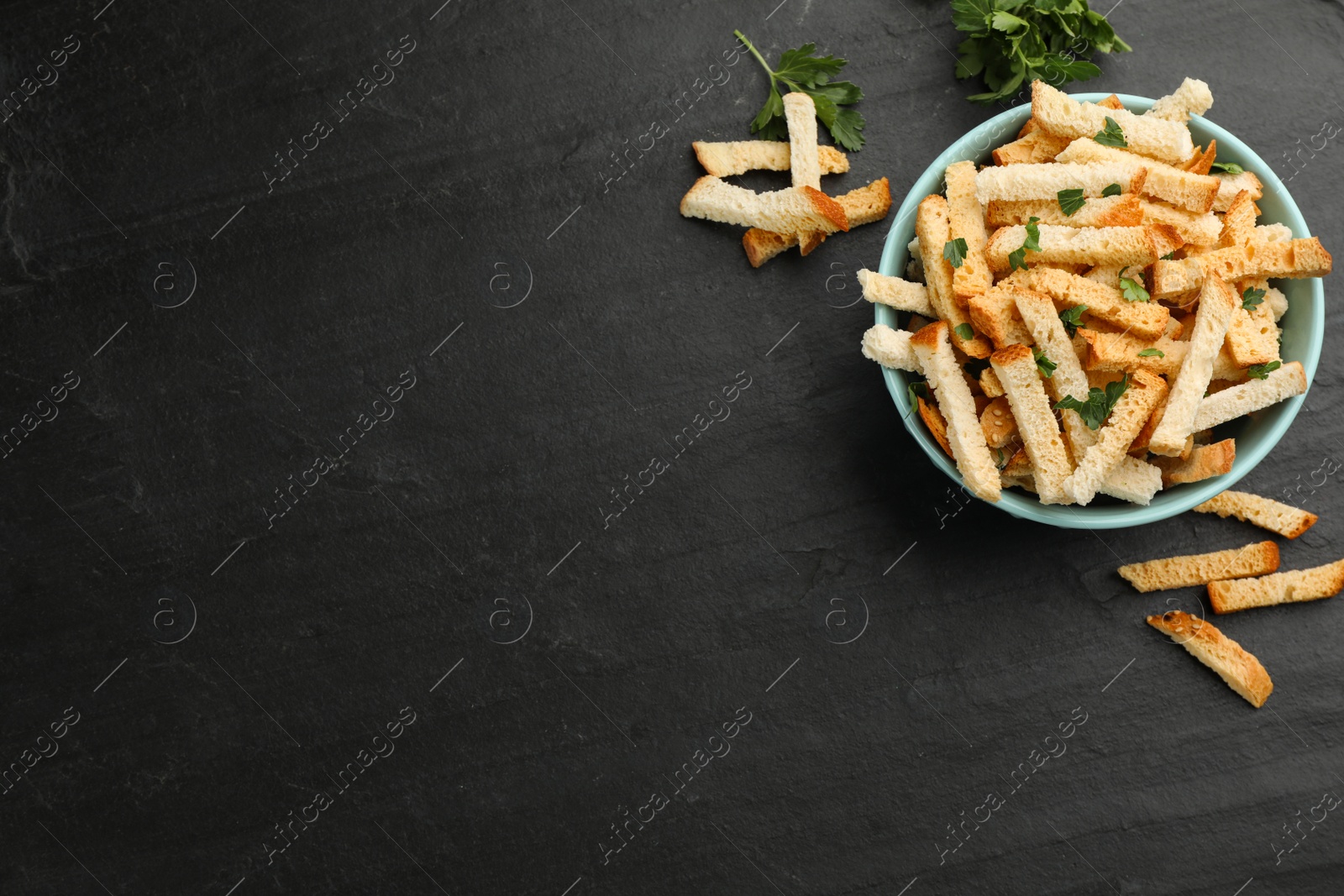 Photo of Delicious hard chucks on black table, flat lay. Space for text