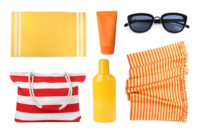 Set with towels and other beach accessories on white background