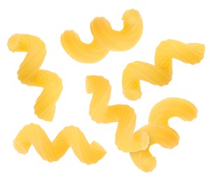 Raw cavatappi pasta falling on white background