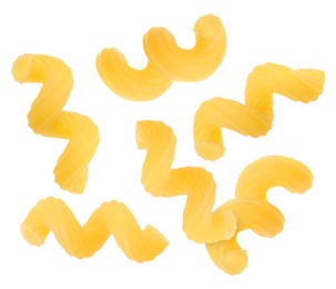 Image of Raw cavatappi pasta falling on white background