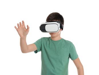 Photo of Teenage boy using virtual reality headset on white background