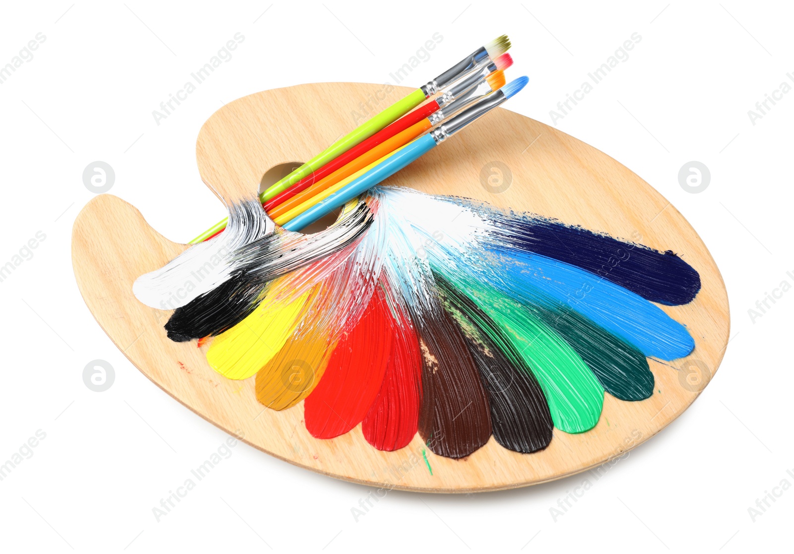 Photo of Palette with paints and brushes on white background. Artist equipment