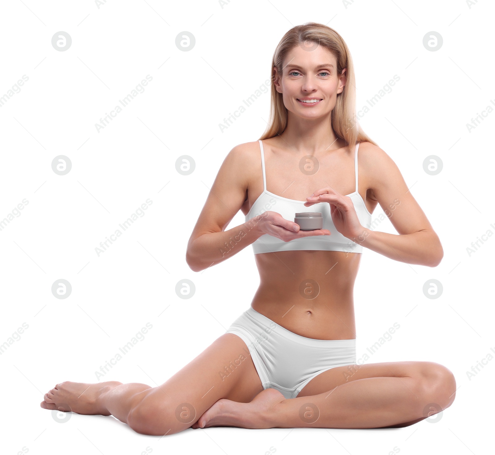 Photo of Woman with jar of body cream on white background