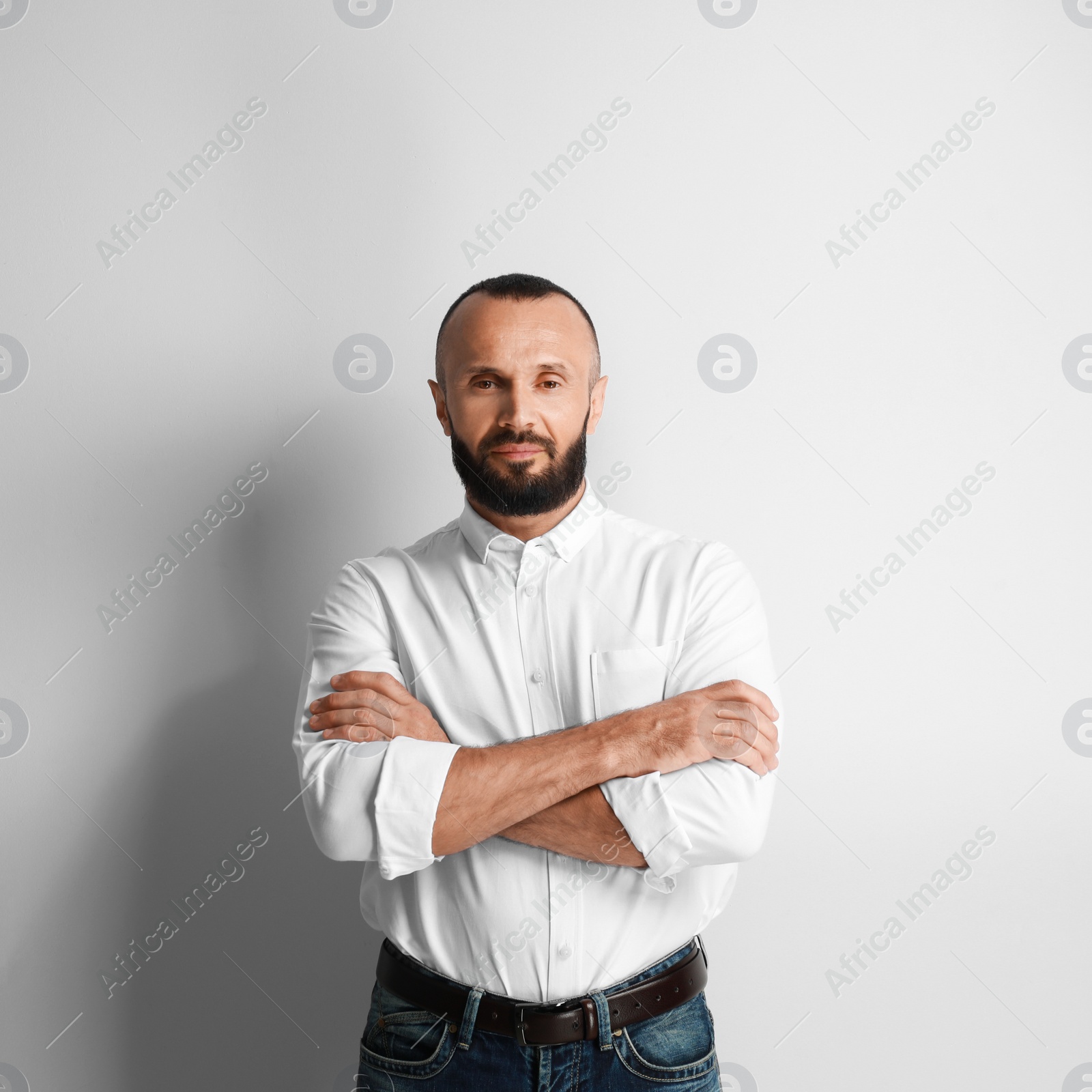 Photo of Portrait of handsome man on white background