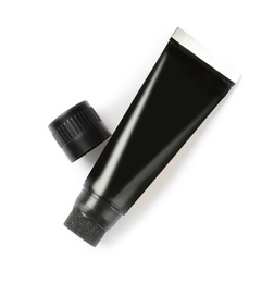 Tube of shoe care product on white background, top view