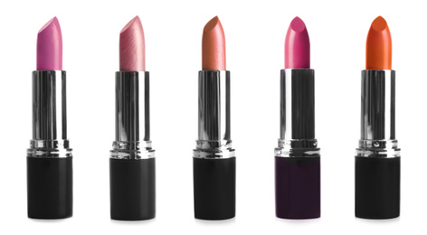 Image of Set with different lipsticks on white background