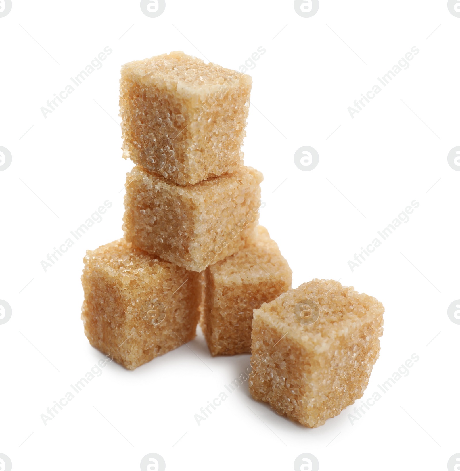 Photo of Cubes of brown sugar isolated on white