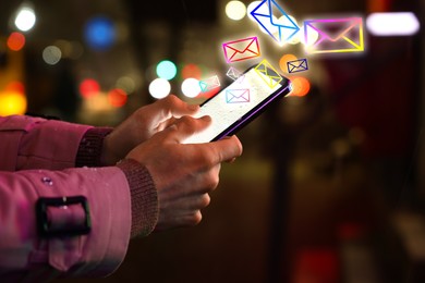 Man with smartphone chatting outdoors, closeup. Many illustrations of envelopes as incoming messages out of device