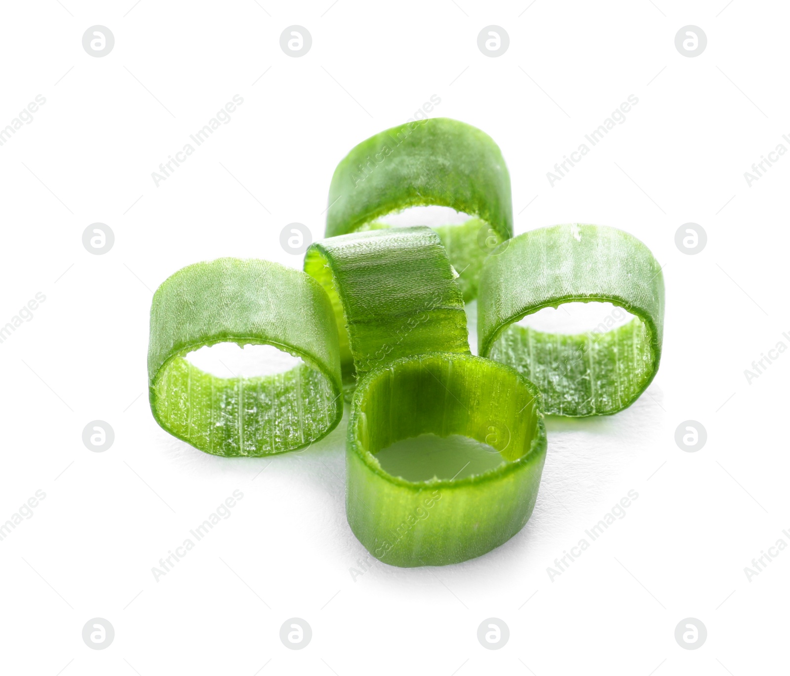 Photo of Cut fresh green onion on white background