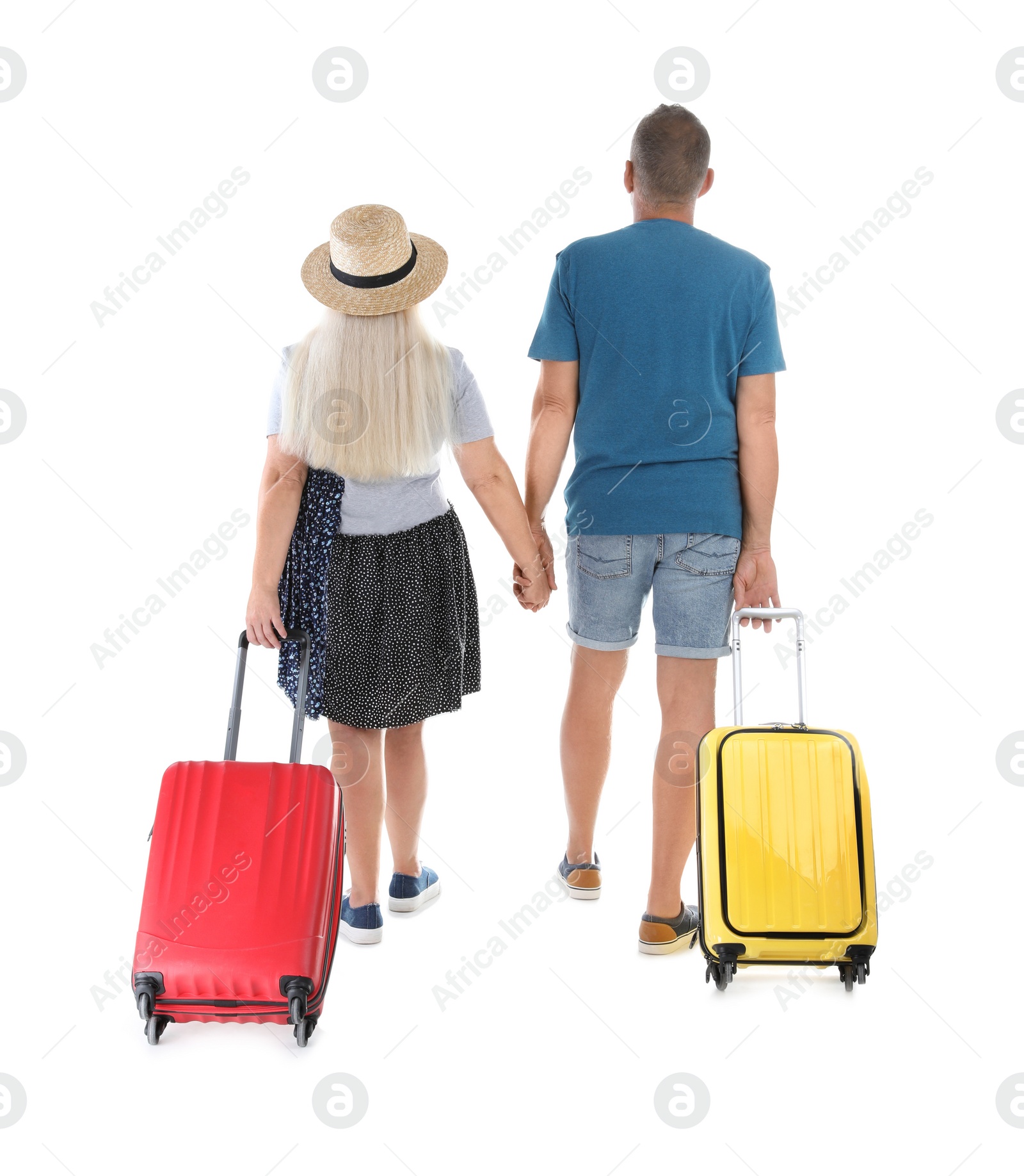 Photo of Senior couple with suitcases on white background. Vacation travel