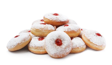 Photo of Delicious donuts with jelly and powdered sugar on white background