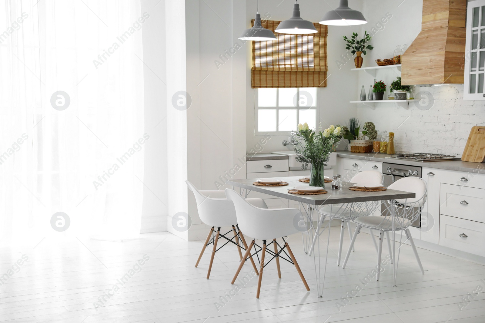 Photo of Beautiful kitchen interior with new stylish furniture