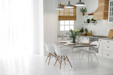 Photo of Beautiful kitchen interior with new stylish furniture