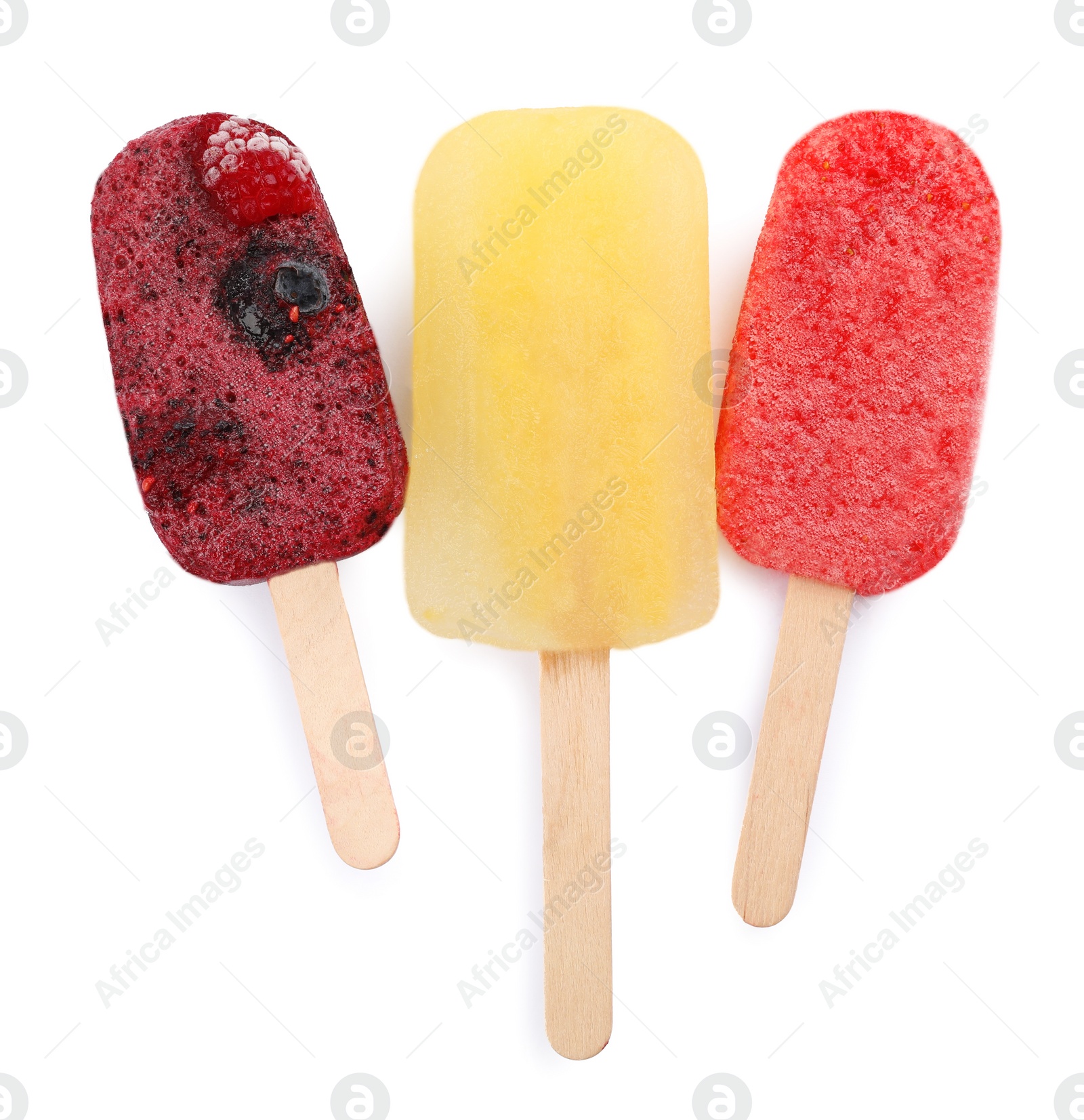 Photo of Different tasty ice pops isolated on white, top view. Fruit popsicle