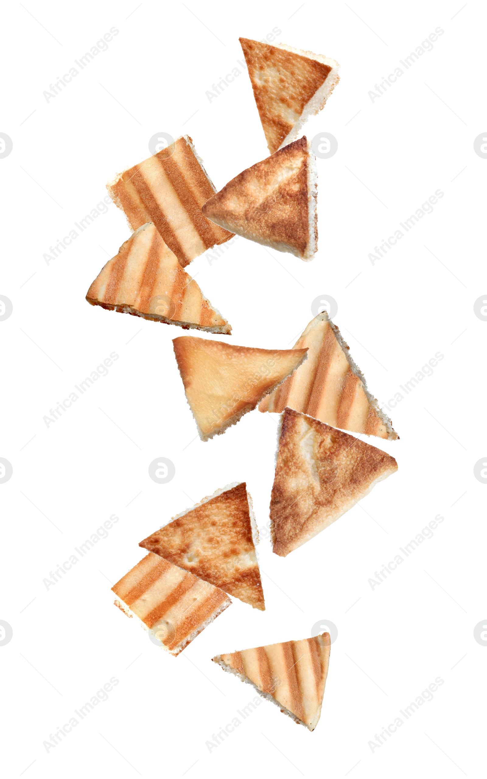 Image of Delicious crispy pita chips falling on white background