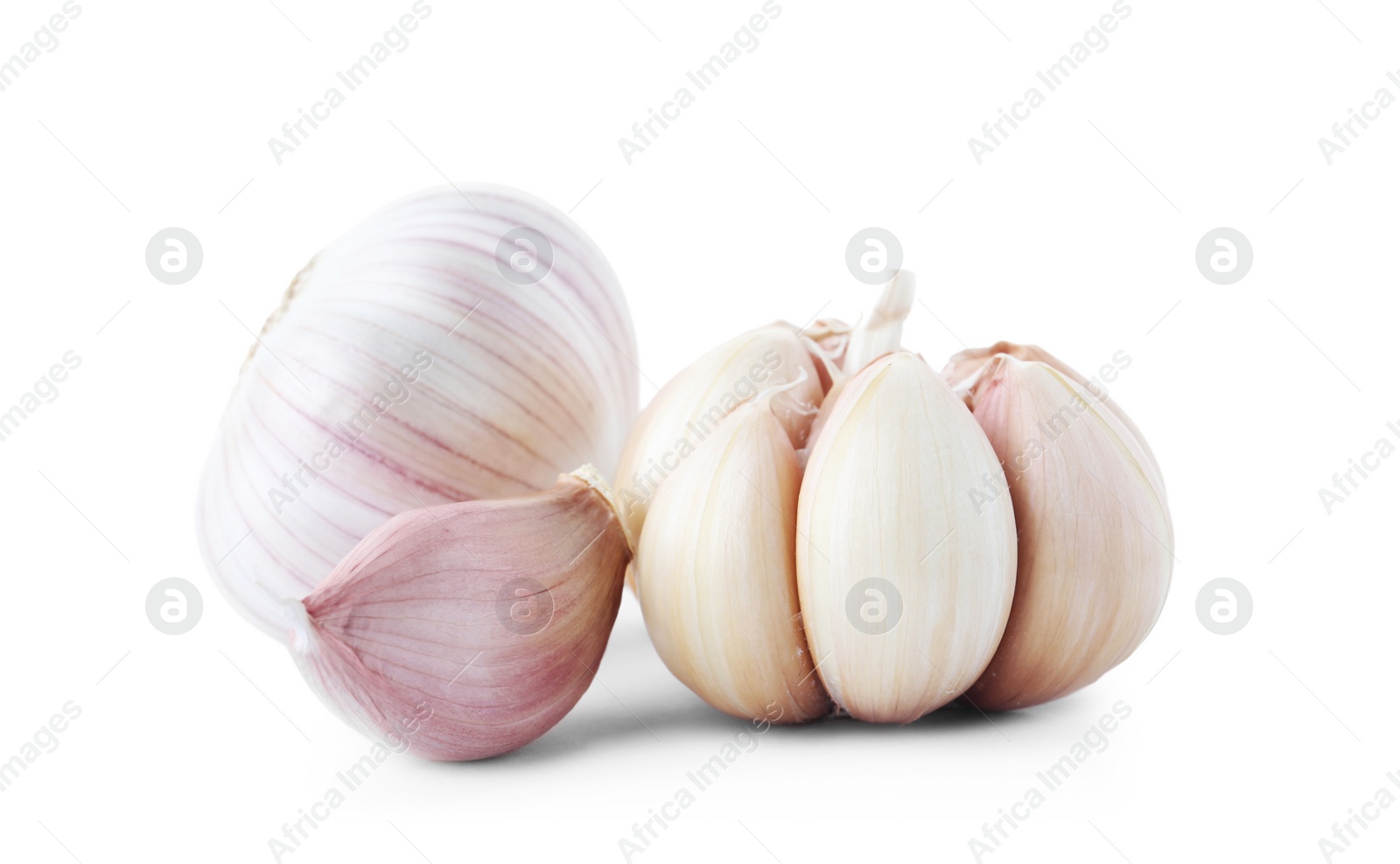 Photo of Fresh garlic bulbs and clove on white background