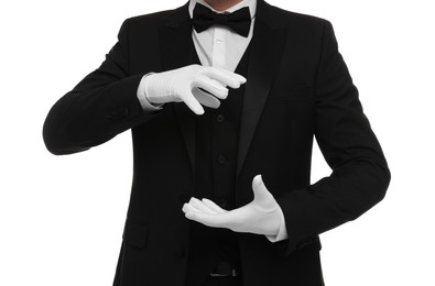 Photo of Magician holding something on white background, closeup