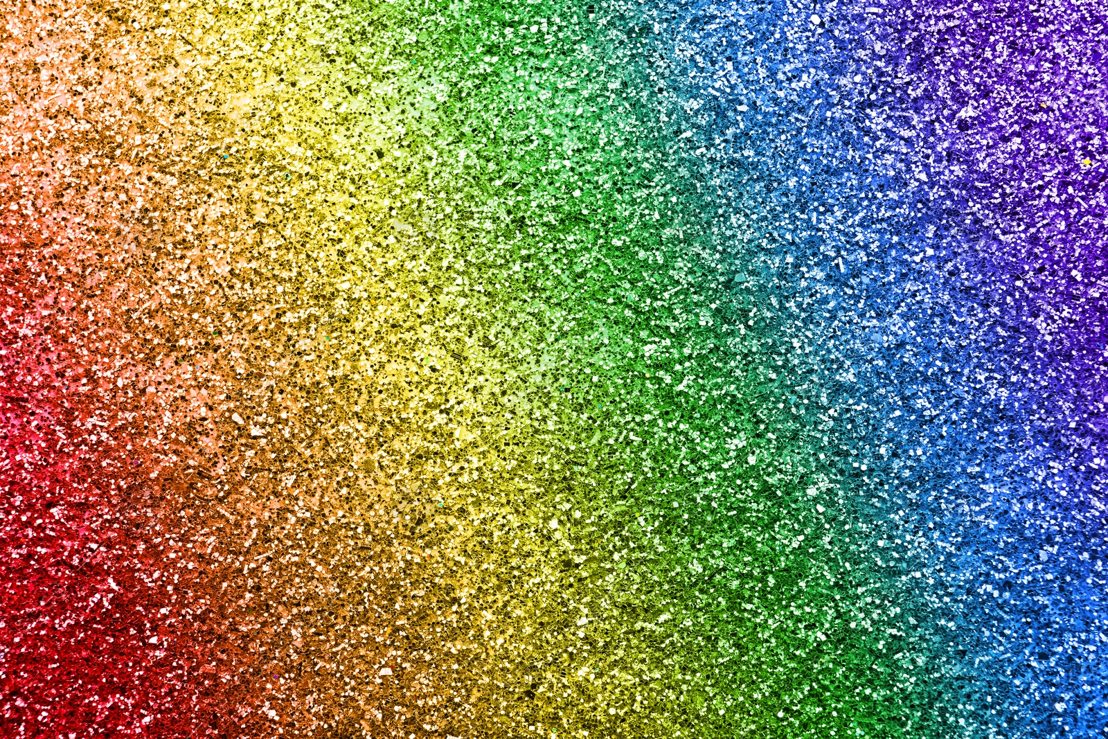 Image of Beautiful shiny glitter in rainbow colors as background, closeup