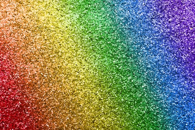 Image of Beautiful shiny glitter in rainbow colors as background, closeup