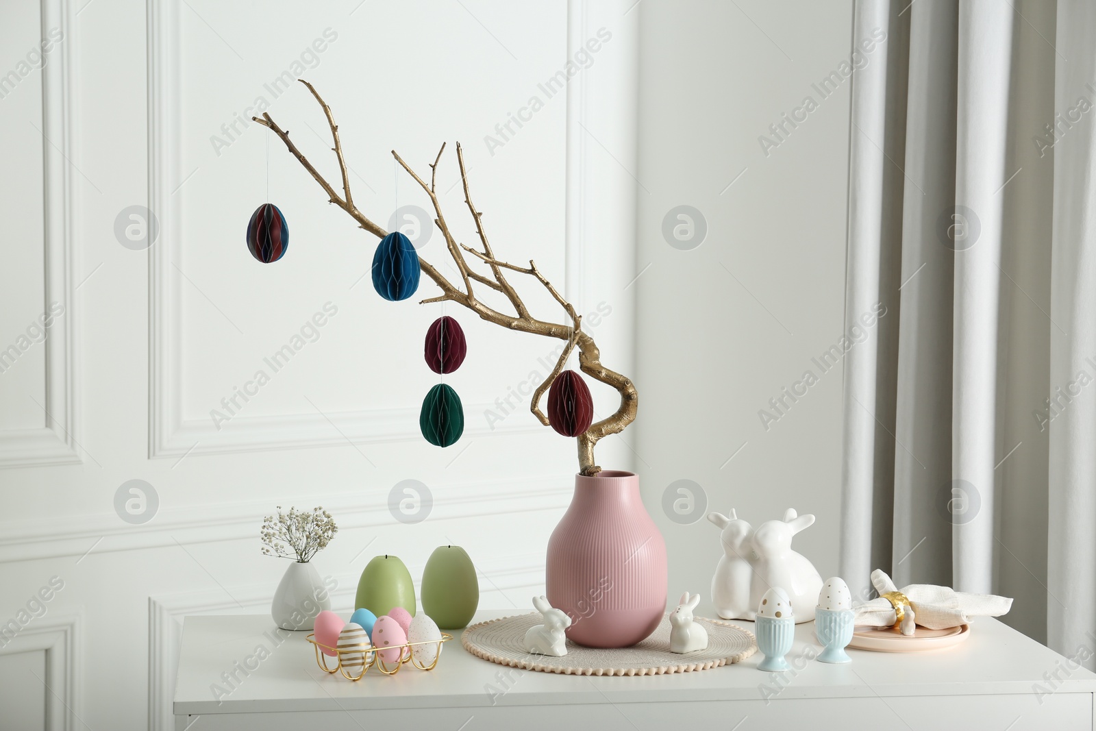 Photo of Beautiful festive composition with Easter decor on white table indoors