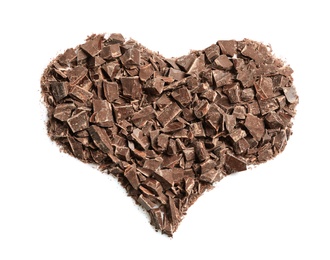 Heart made with dark chocolate crumbles on white background, top view