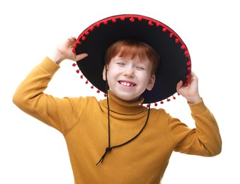 Cute boy in Mexican sombrero hat on white background