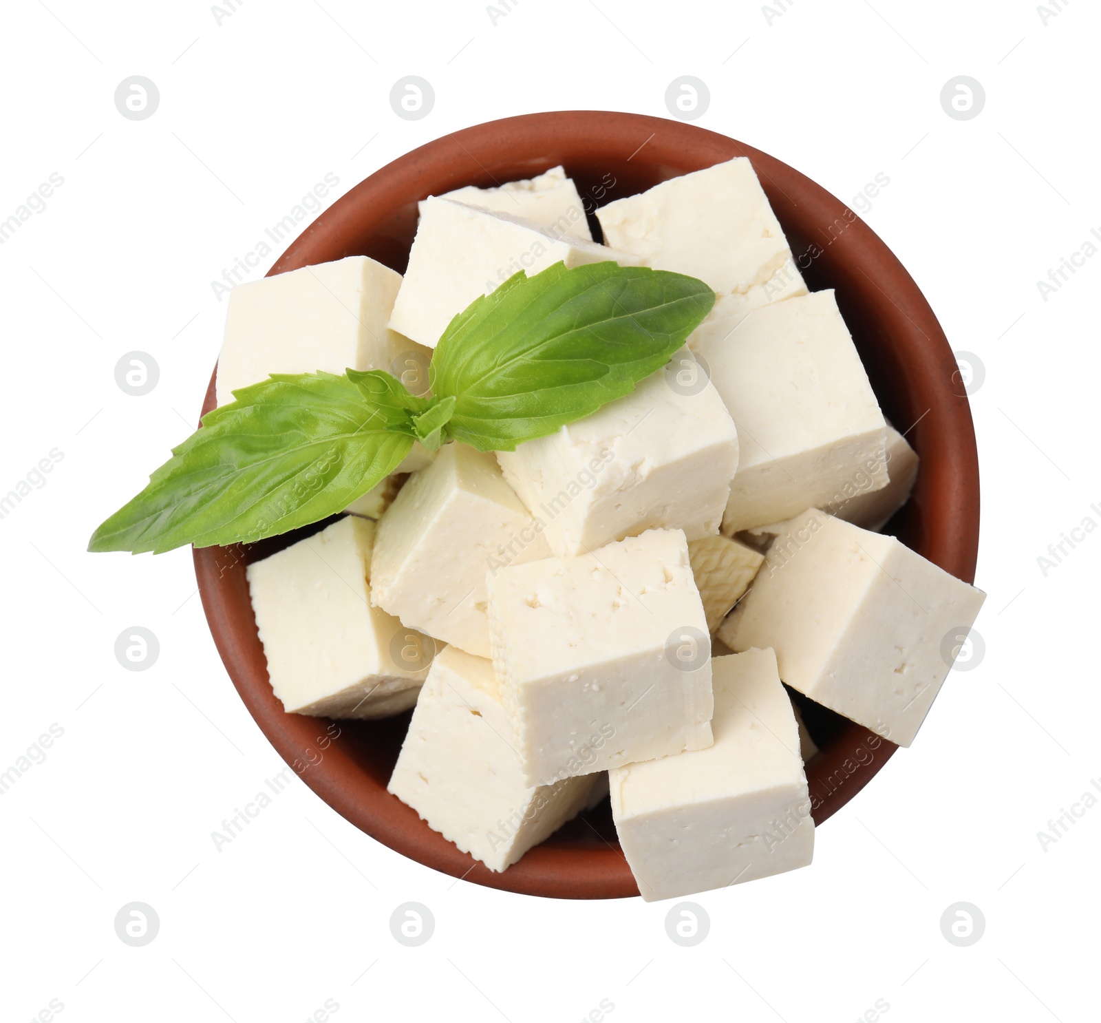 Photo of Delicious tofu cheese and basil on white background, top view