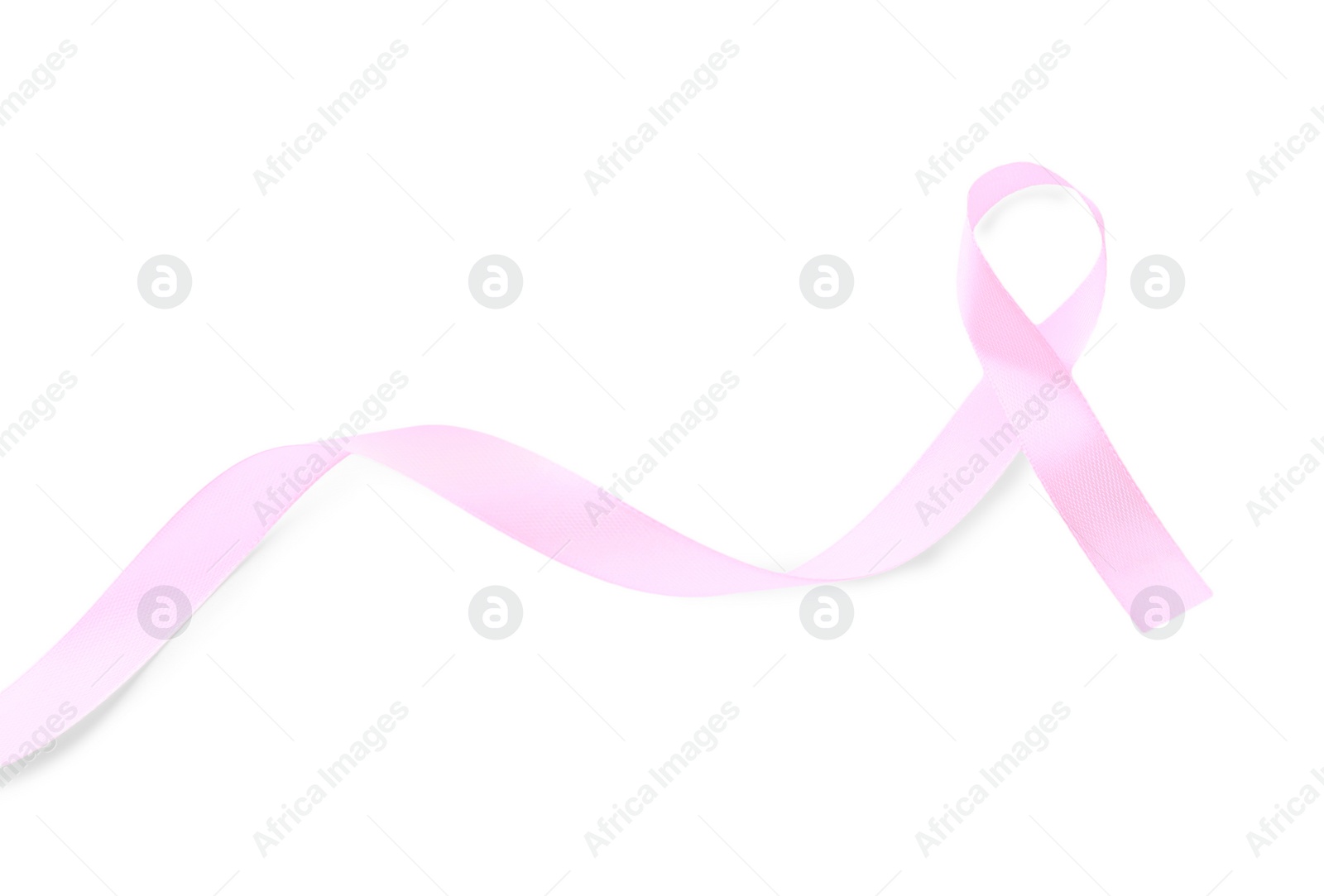 Photo of Pink awareness ribbon isolated on white, top view