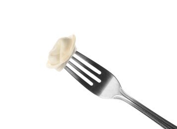 Fork with tasty dumpling isolated on white