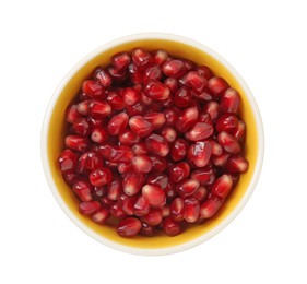 Ripe juicy pomegranate grains in bowl isolated on white, top view