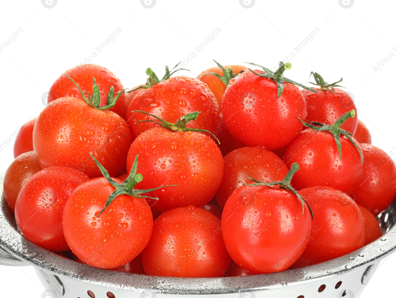 Colander with fresh ripe cherry tomatoes isolated on white Photo of Colander with fresh ripe cherry tomatoes isolated on white