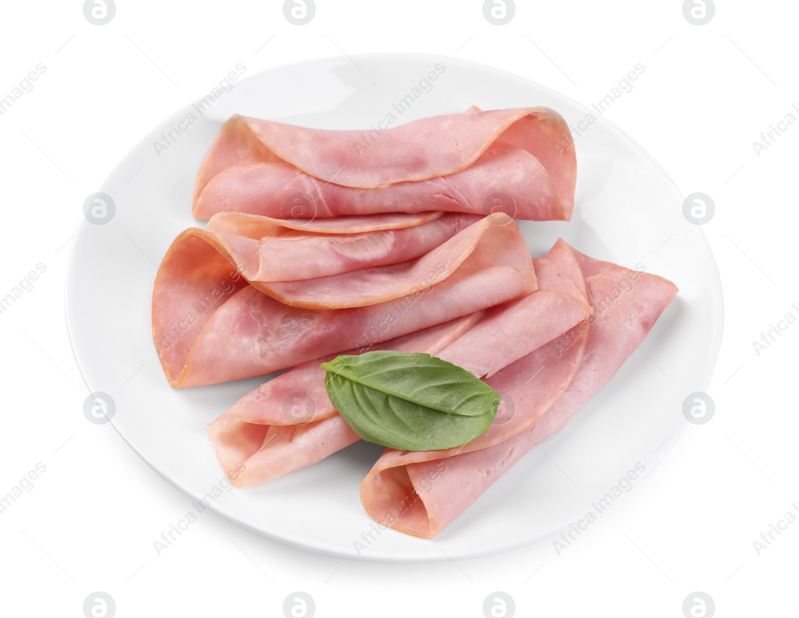 Photo of Slices of tasty ham and basil isolated on white