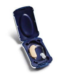 Photo of Case with hearing aid on white background