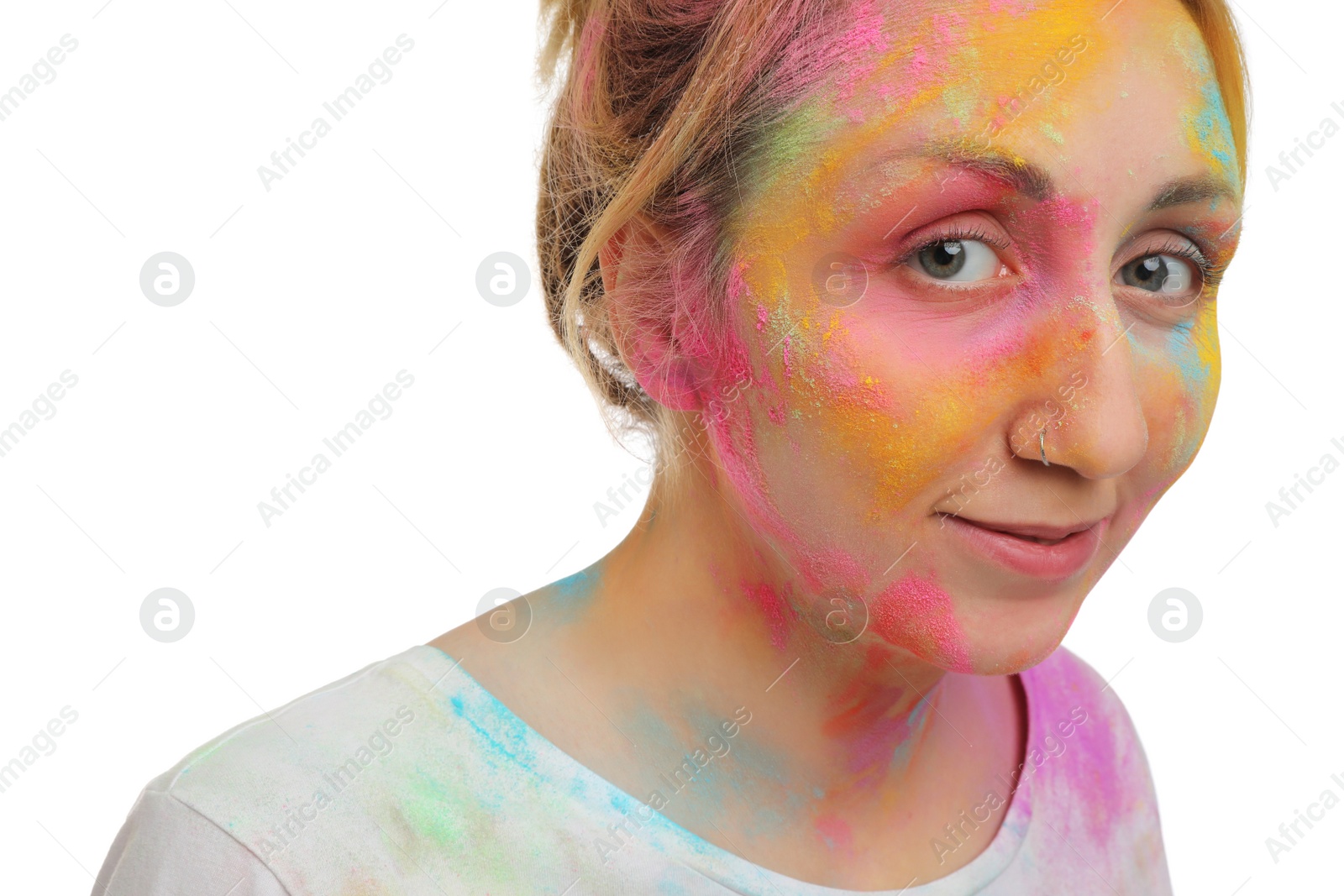 Photo of Woman covered with colorful powder dyes on white background. Holi festival celebration