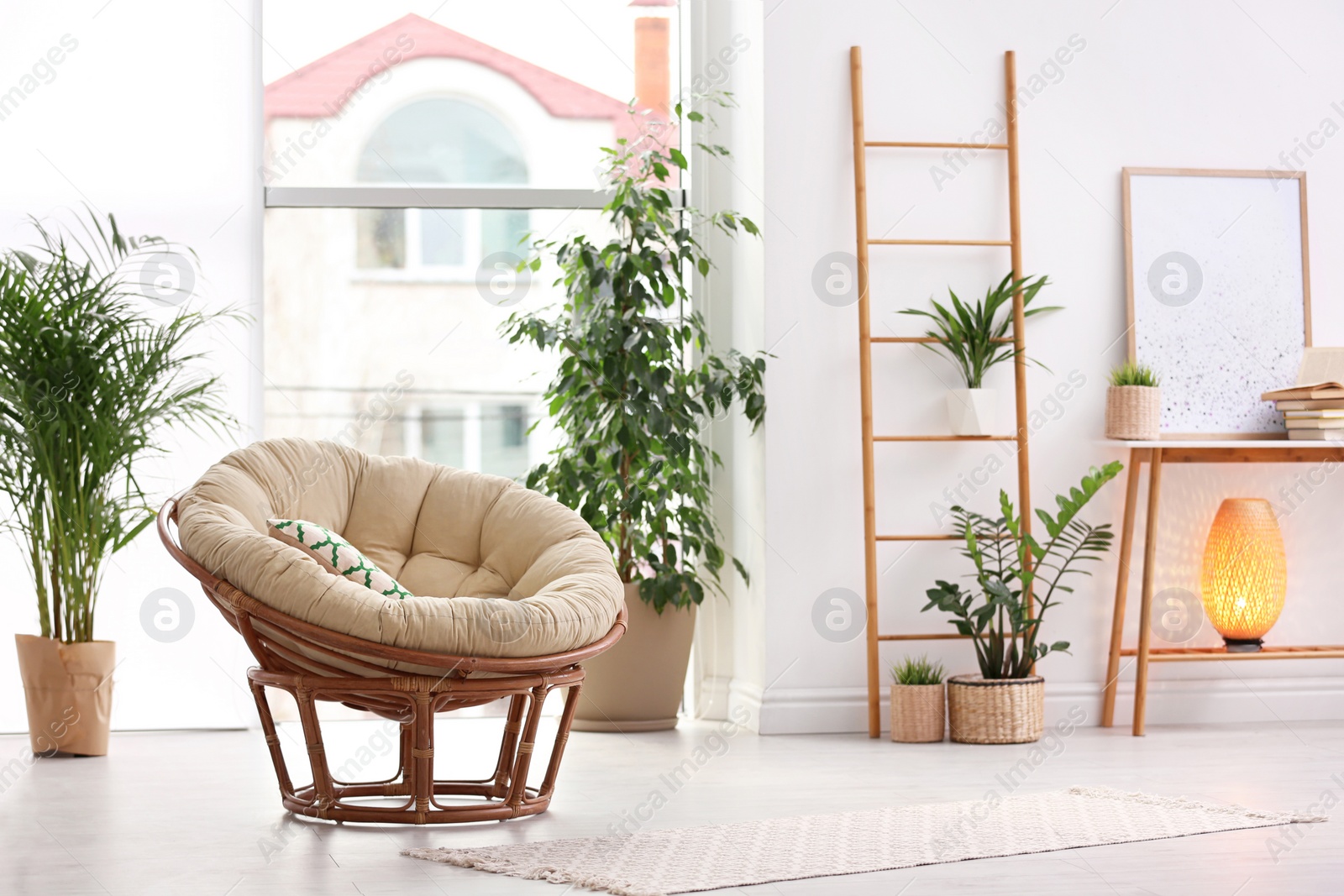 Photo of Stylish modern room interior with exotic houseplants