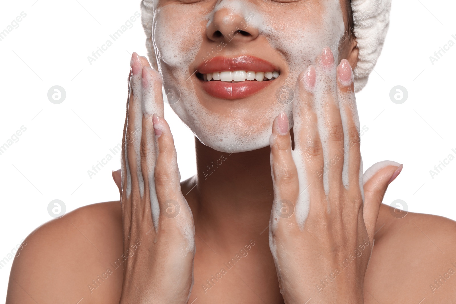 Photo of Beautiful woman applying facial cleansing foam on white background, closeup