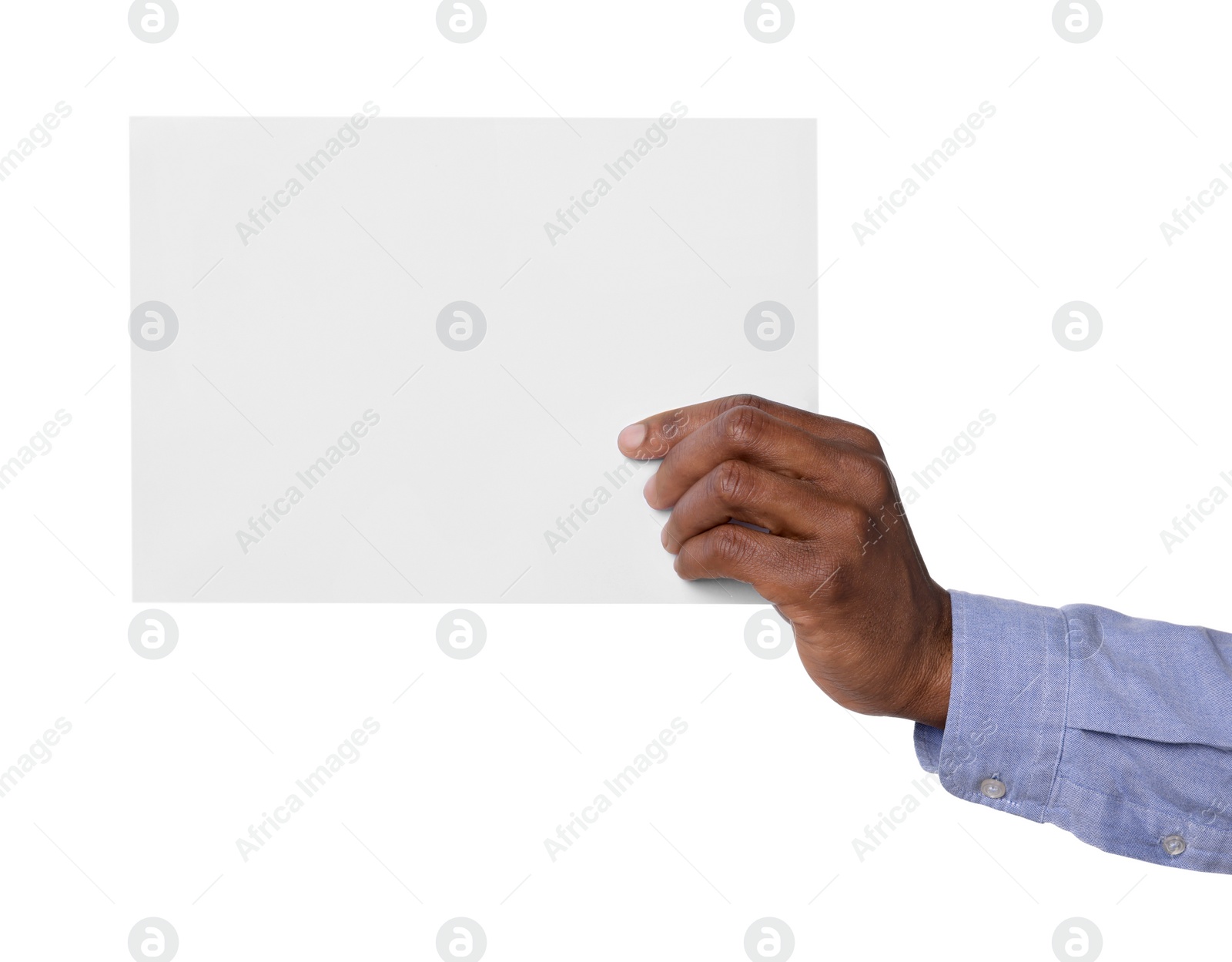 Photo of African American man holding sheet of paper on white background, closeup. Mockup for design