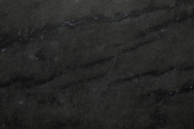 Photo of Black marble surface as background, closeup view