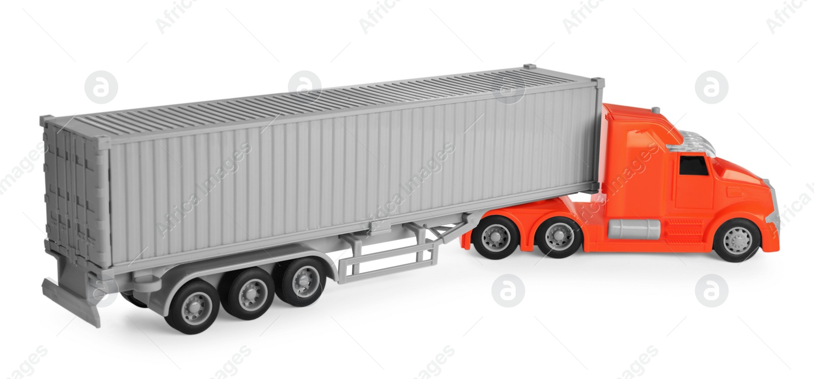 Photo of Toy truck with container isolated on white. Export concept