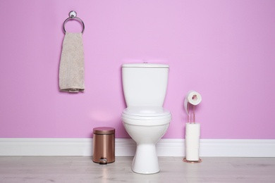 Photo of New ceramic toilet bowl in modern bathroom