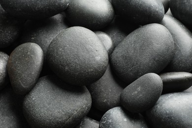 Photo of Many different stones as background, closeup view