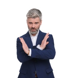 Mature businessman in stylish clothes posing on white background